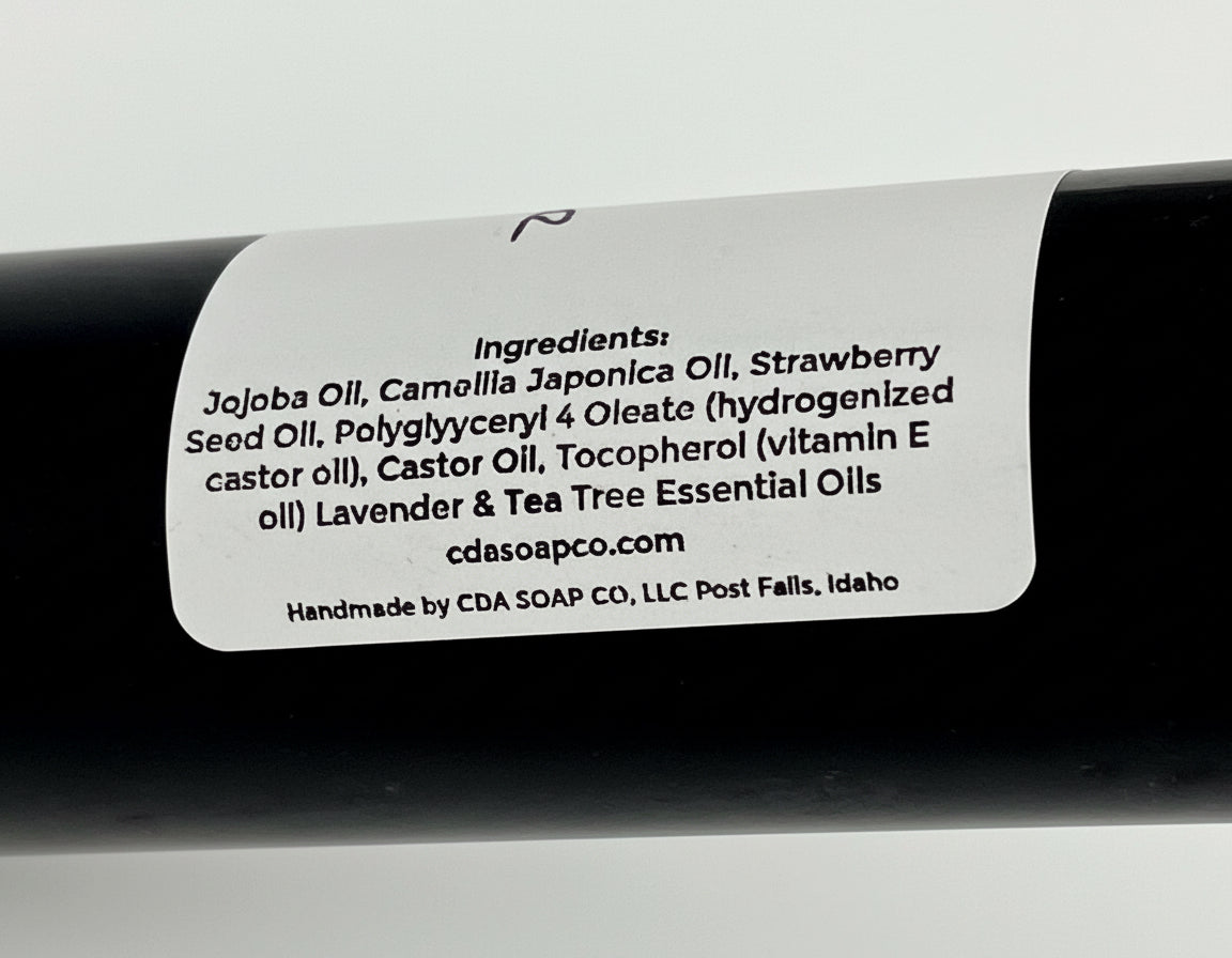 Label with ingredients list on a black bottle
