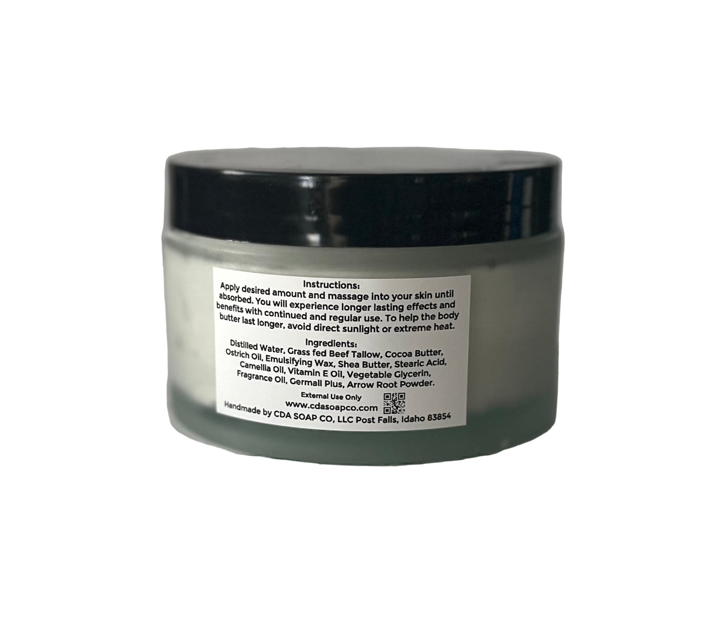 Jar of body butter with an ingredient label on a white background