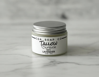 Jar of CDA Soap Co Tallow & Ostrich Balm on a gray background