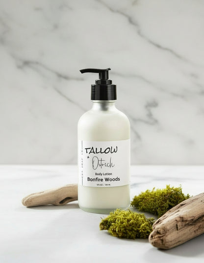 Lotion bottle on a white background with stones and wood.