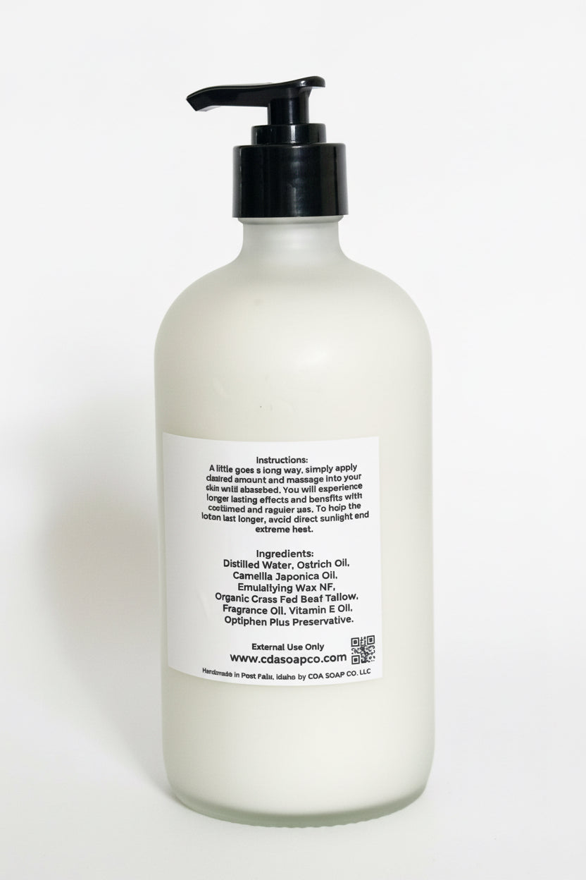 White bottle with black pump and label on a white background