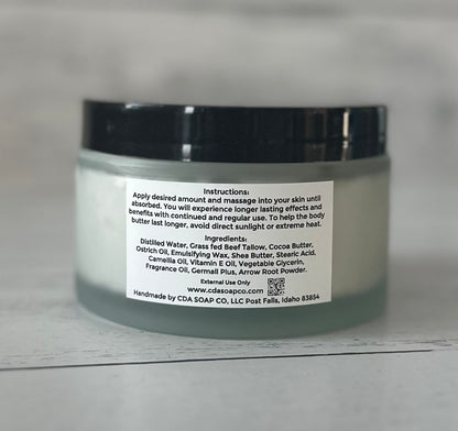 Jar of body butter with ingredient label on a gray background