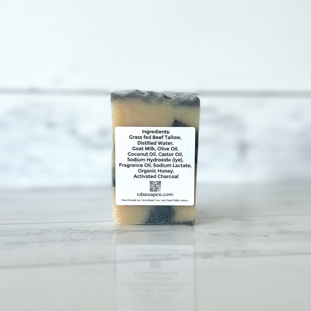 Bar of soap with a ingredient label on a marble surface