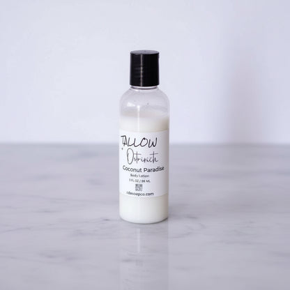 small bottle of coconut paradise lotion neutral background