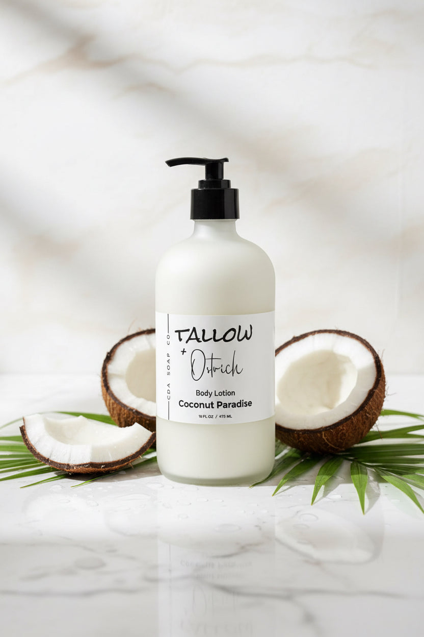 Commit paradise Tallow & ostrich oil CdA soap Co. body lotion bottle with coconuts and palm leaves on a marble background