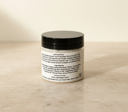 ingredient side of capri blue tallow body butter jar with white background