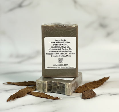 soap with label marble background with tobacco and oud accents