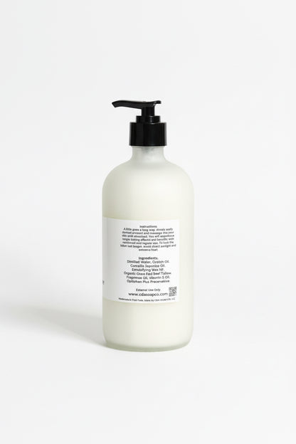 White bottle with black pump on a white background