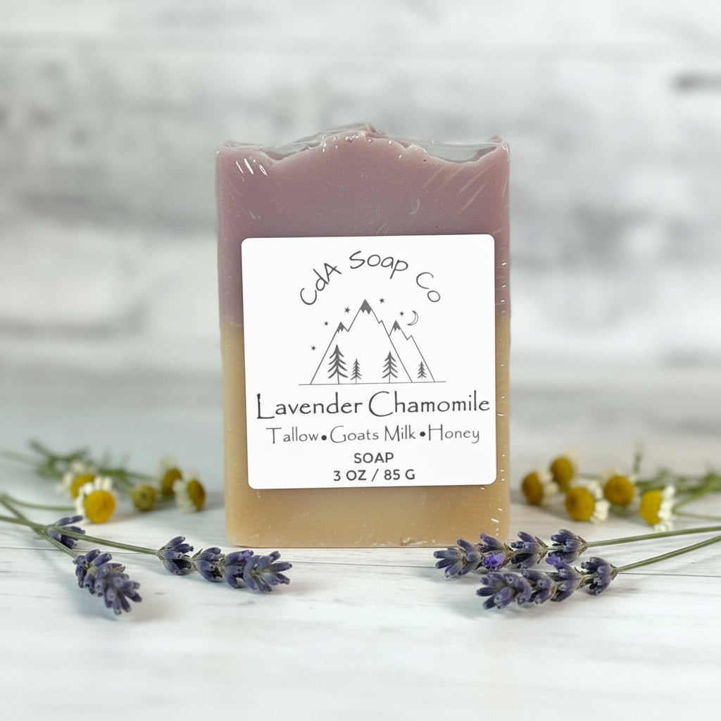 Bar of lavender chamomile soap with a label on a white background with lavender and flowers.