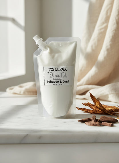 Tallow body lotion packaging on a marble surface with natural light
