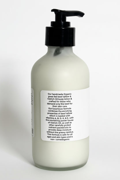 Bottle of lotion with a pump and label on a white background