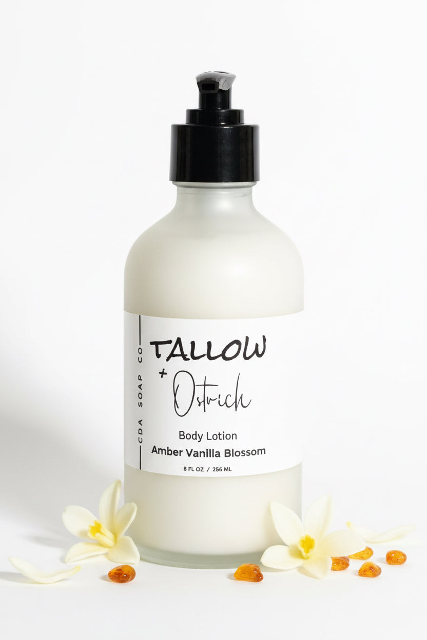 Amber vanilla blossom Body lotion bottle with label on a white surface