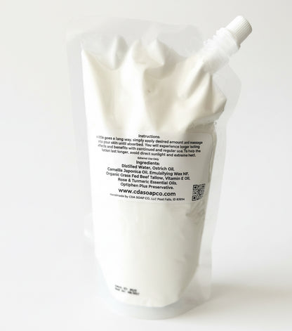White lotion pouch with a label on a white background