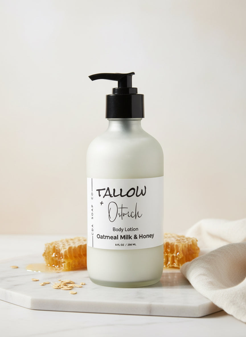 Body lotion bottle with pump on a marble surface with honeycomb and oats, against a light background.