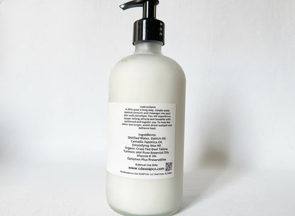 White bottle with pump dispenser on a white background