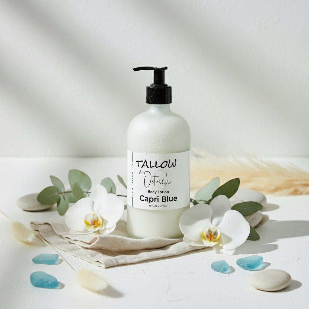 Capri blue Body lotion bottle with pump on a white surface with flowers and stones