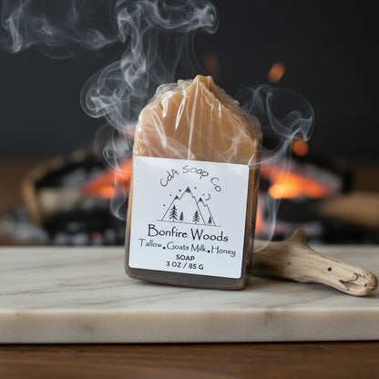 Soap bar labeled 'Bonfire Woods' by CdA Soap Co. with smoke and a fire in the background.