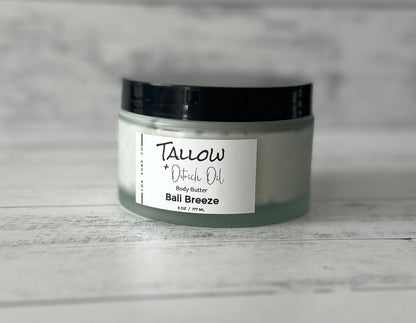 Jar of Tallow and ostrich Oil Body Butter labeled 'Bali Breeze' on a gray background