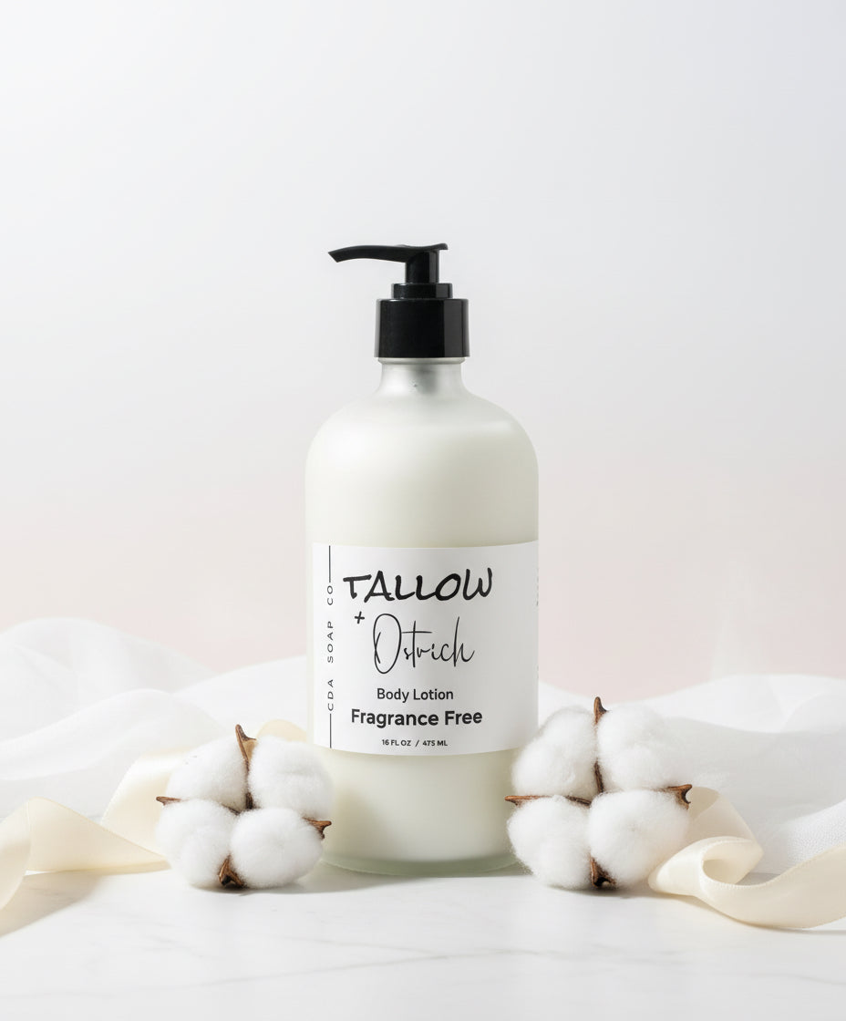 Fragrance free Body lotion bottle with cotton on a white background