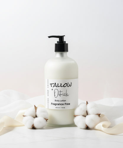 Fragrance free Body lotion bottle with cotton on a white background