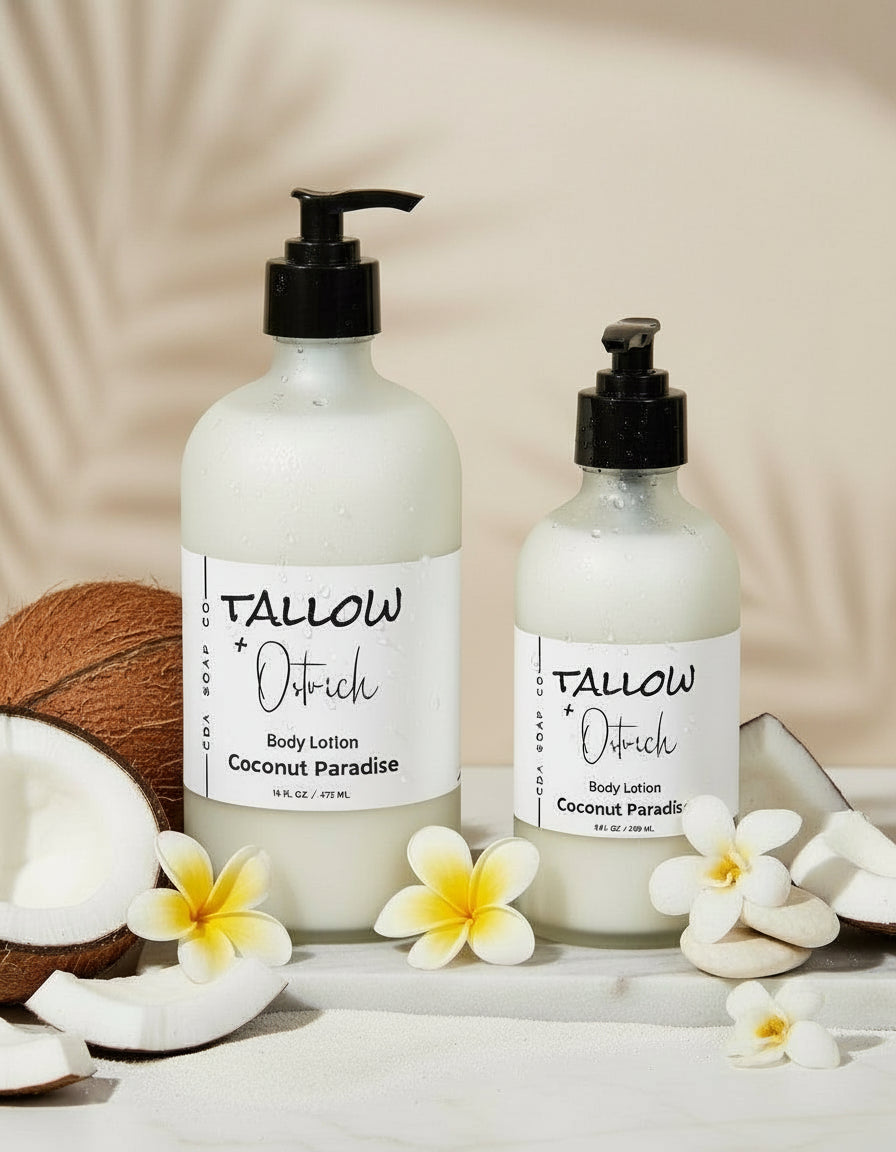 Two bottles of Tallow & Ostrich body lotion with coconut and flowers on a light background