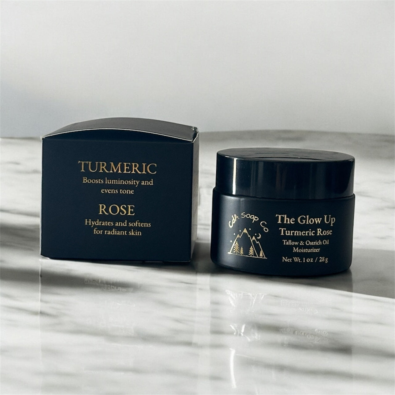 Black Cosmetic jar and packaging on a marble surface