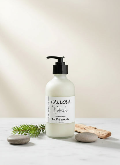 Body lotion bottle labeled 'Tallow & Ostrich CdA soap Co.' with a white background