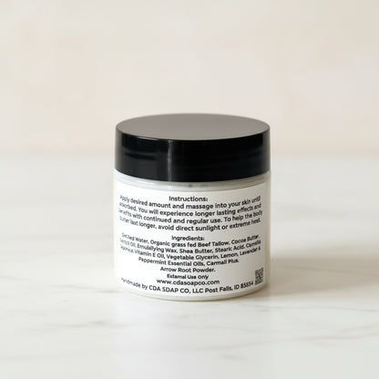 Jar with black lid and white label on a wooden surface