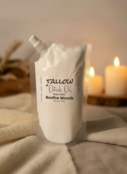 Tallow + Oatrich Oil body lotion packaging with candles in the background