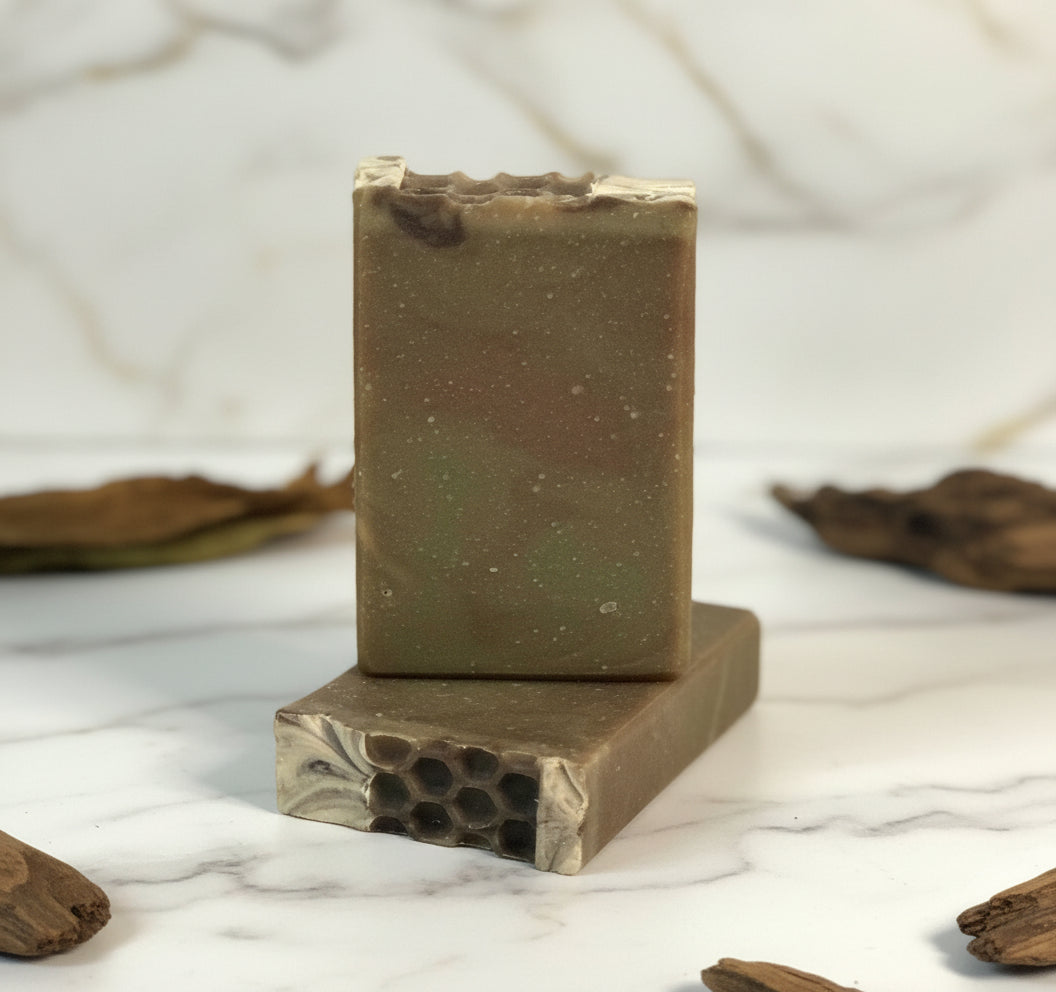 bars of soap light marble background with tobacco accents