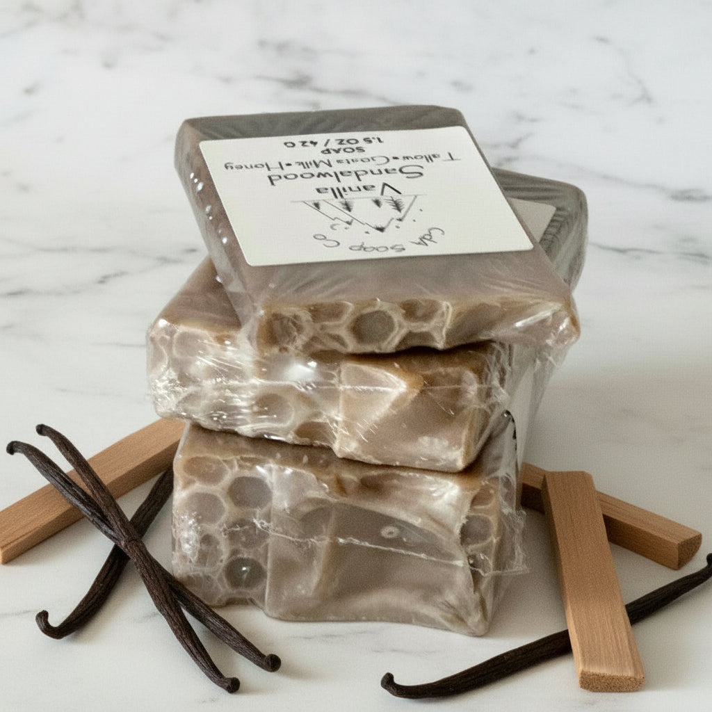 Stack of honeycomb-patterned soap bars with a label on amarble surface