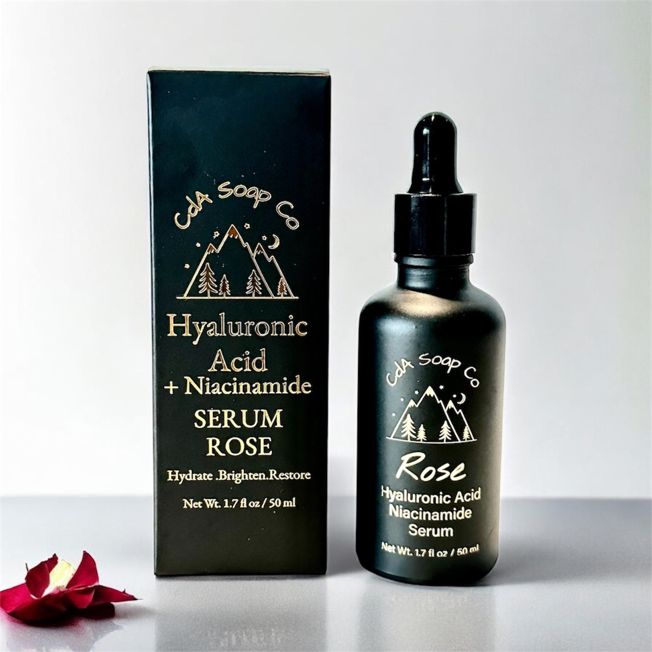 CDA Soap Co. Hyaluronic Acid + Niacinamide Serum Rose bottle and packaging on a white background.