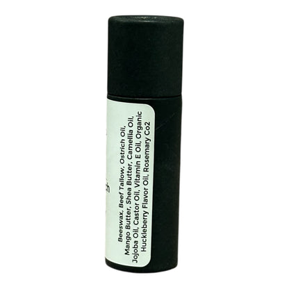 Black cylindrical container with a white label on a white background