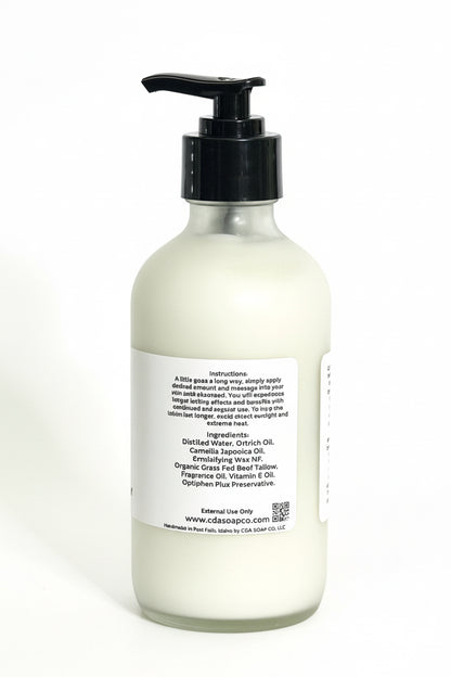 White bottle with black pump on a white background