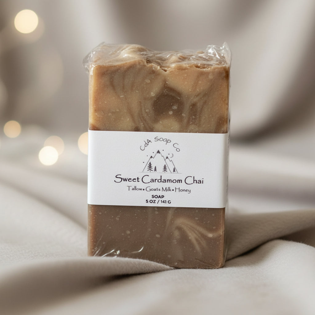 Bar of soap with a label on a soft fabric background