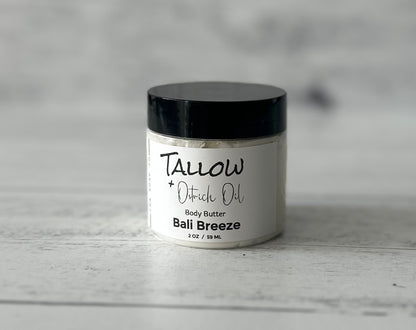 Small Jar of Tallow + ostrich Oil Body Butter on a wooden surface