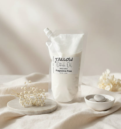 Fragrance-free body lotion pouch on a neutral background with flowers and stones.