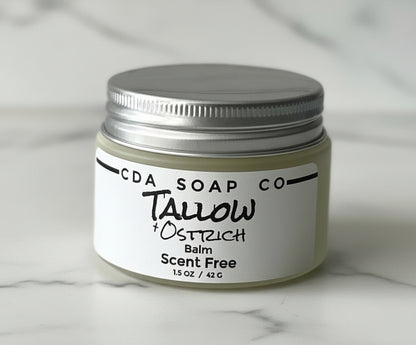 Jar of CDA Soap Co Tallow & Ostrich Balm on a marble surface