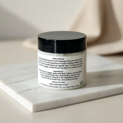 Jar with black lid on a gray surface