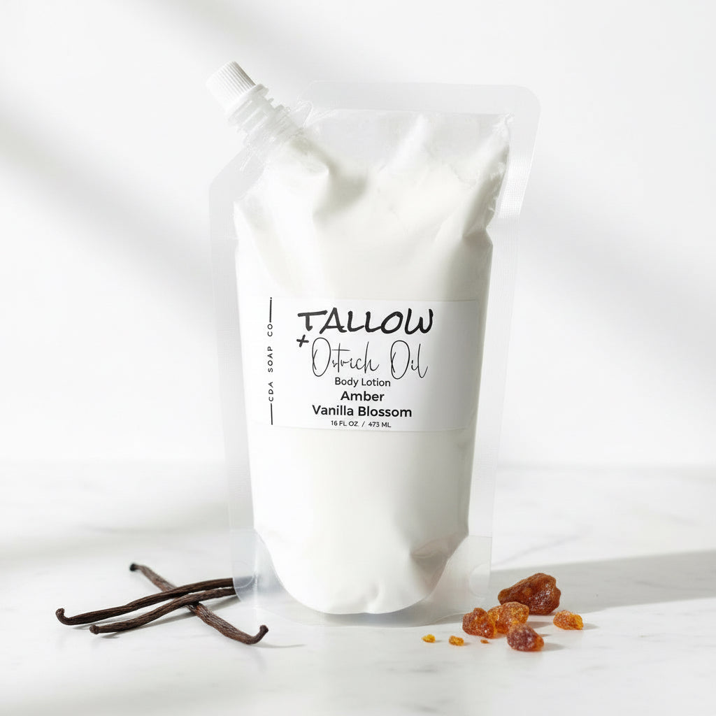 White bag of Tallow + Ostrich Oil body lotion with vanilla and amber elements on a white background