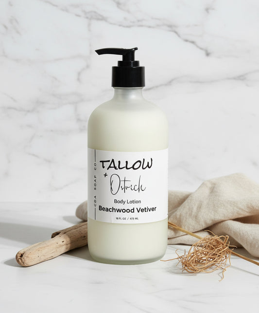 Beachwood Vetiver Body lotion bottle labeled 'Tallow + Ostrich oil' on a marble background