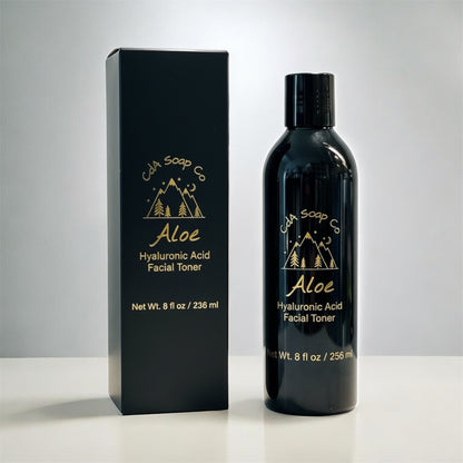 Black bottle and packaging of Cda Soap Co Aloe Hyaluronic Acid Facial Toner on a white background