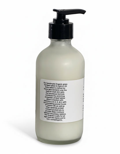 Bottle of lotion with pump and label on a white background