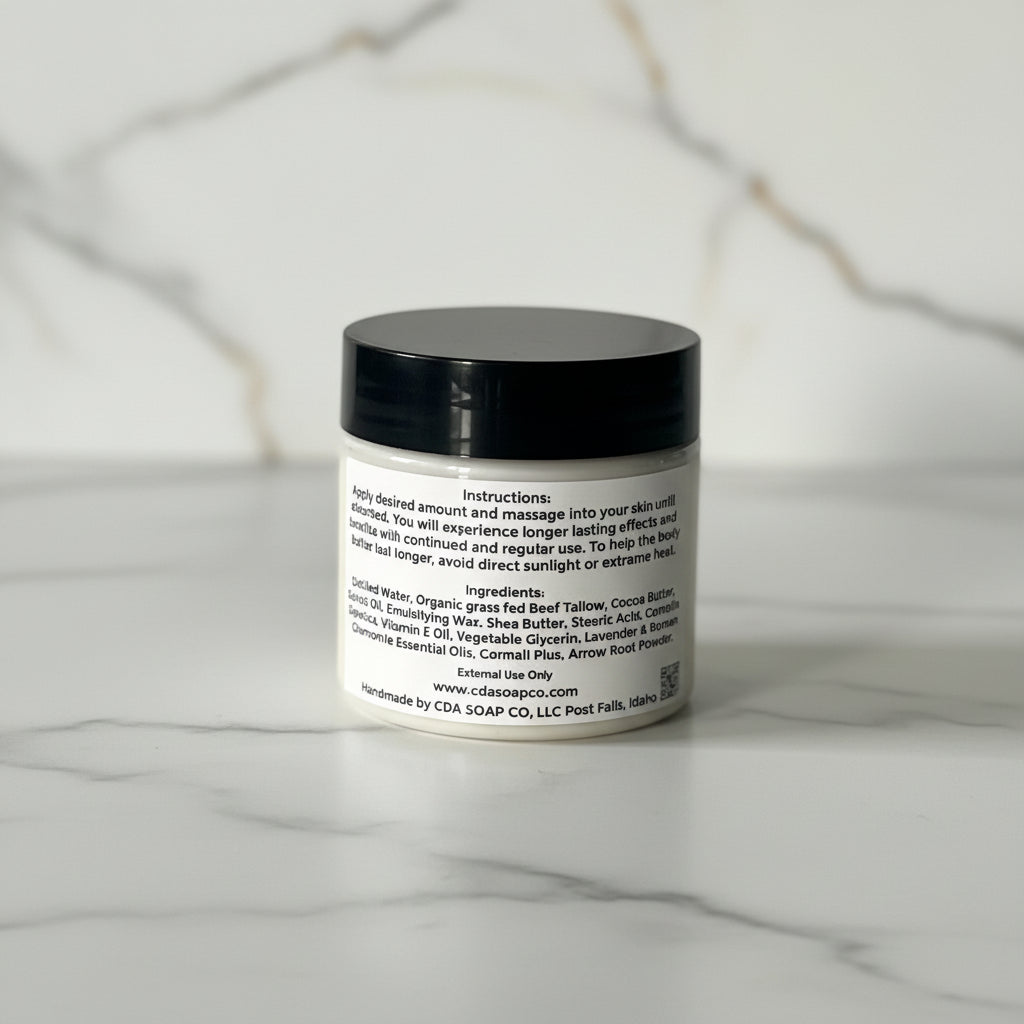 Jar of cream with black lid on a gray surface