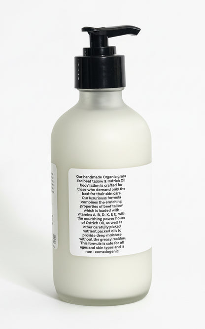 Body lotion bottle with pump and label on a white background