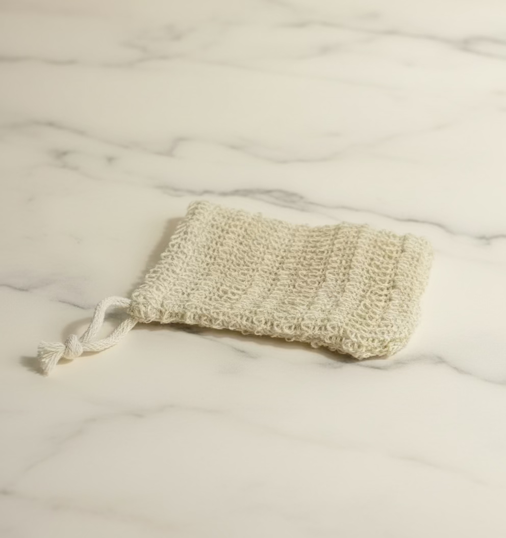 Textured soap bag on a marble background