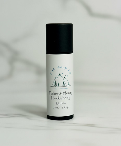 lip balm tube marble background